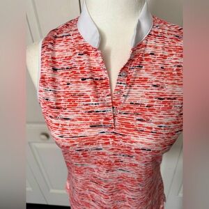 PHA TOUR orange and white golf top